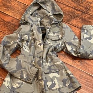 Small camouflage jacket with removable hood